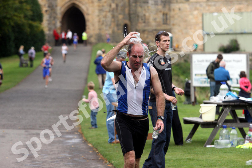Cooling down, Alnwick Castle as the backdrop during the Bamburgh Triathlon